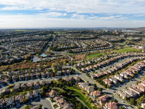Aerial view of upper middle class neighborhood with identical residential subdivision house
